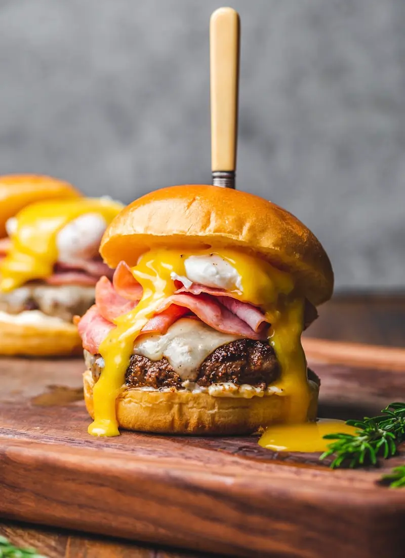 Homemade cheeseburger with melted cheese and sauce