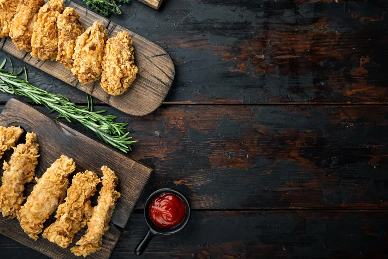 Golden fried chicken pieces served at home
